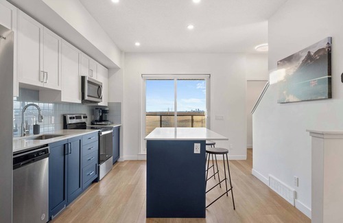 Calgary House | Skyline Retreat | Spacious 4BR Home with Balcony!
