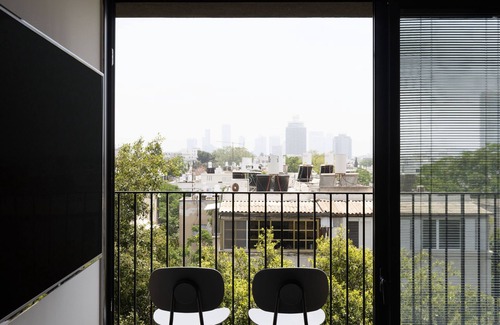 Old North Apartment | Skyline Serenity by tlv2rent
