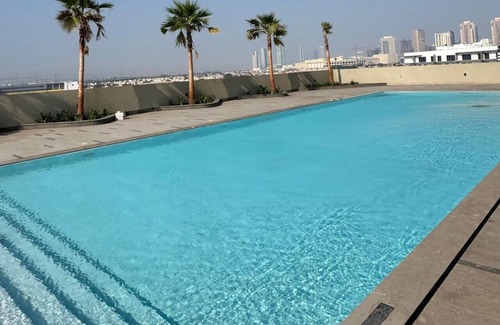 Jumeirah Village Triangle Apartment | Skyline Views: Sunset One Bedroom