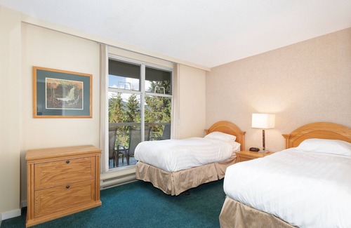 Upper Village Cabin | Slopeside Ski In/Out, corner unit, forest view | Pool & Hot Tub, great for families | Calling in NA