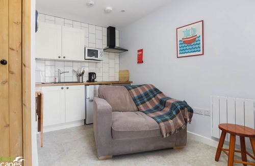Ballasalla Cottage | Small, but perfectly formed encapsulates this one up, one down maisonette in the small village of Ba
