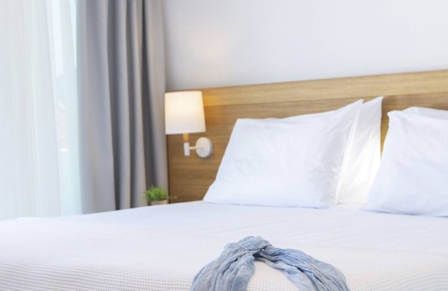 Nidri Hotel | Smile Inn Luxury Accommodation nIn the center of Nidri, next to the sea