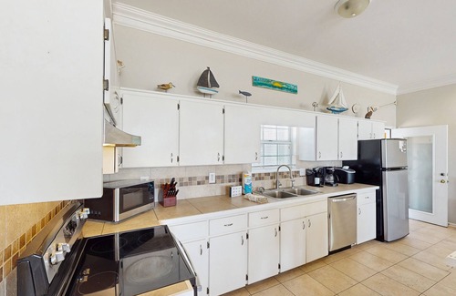 St. George Island House | Snowbird-friendly beach house with private deck, A/C, & Fast WiFi