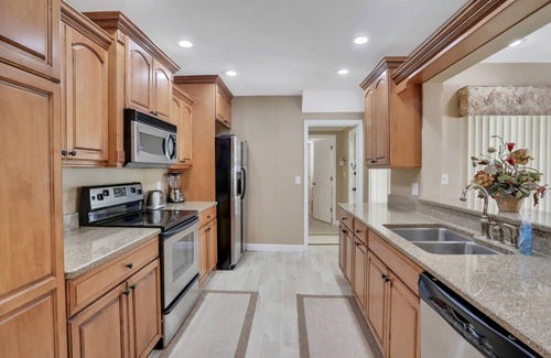 Harbor Hills House | Snowbird-friendly elegant home with waterfront location, pool, grill, fireplace