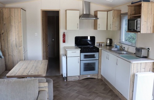 Hamworthy House | Snowdrop Lovely caravan, veranda and dogs stay free at Rockley Park Poole Dorset