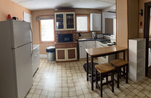 Patten House | Snowmobile trail access. Room for multi-vehicle/trailer parking.