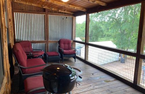 Prairie Lea House | Son's Blue River Camp LogCabin3 - Romantic Log Cabin on the River with view!