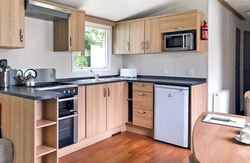 Saint Ann's Chapel House | Spacious 12ft-wide family caravan with one double and one twin.