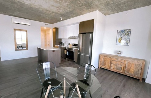 Saint-Laurent Condo | Spacious 2BR with Skyline Views, Near Place Vertu