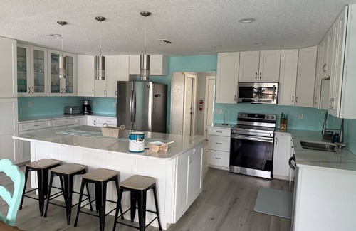 Spring Hill House | Spacious 4BR Waterfront Home w/Heated Pool, Dock & Gulf Access, Sleeps 14+