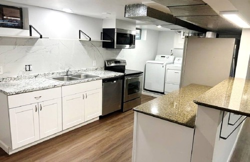 Lewiston House | Spacious 6-bedroom, 2 kitchens, 2 living, 2 dining, 2 laundry. Bring the crew