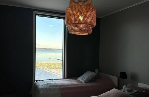 Sotkamo Villa | Spacious beachfront Villa with Panoramic views and outdoor sauna by the Lake.