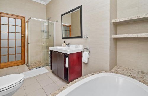 Claremont House | Spacious Claremont Home with Pool Fireplace