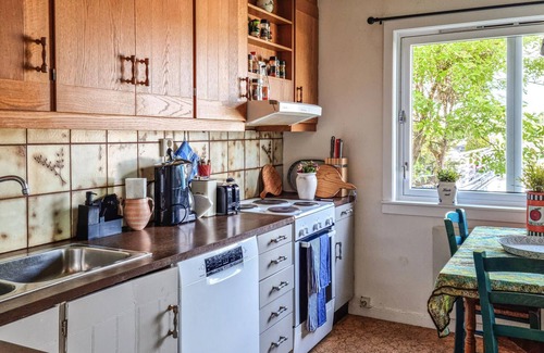 Grimstad House | Spacious cottage with fjord view of old fishing village.