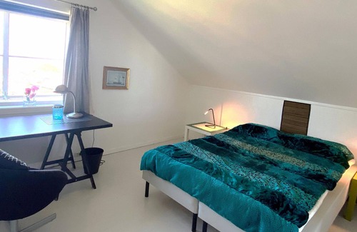 Grimstad House | Spacious cottage with fjord view of old fishing village.