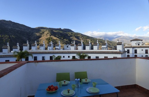 Velez de Benaudalla Apartment | Spacious duplex apt; large roof terrace boasting amazing views & shared pools