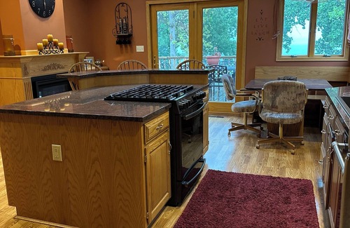 Ortonville House | Spacious home with a large deck and ample space for beautiful sunset viewing!