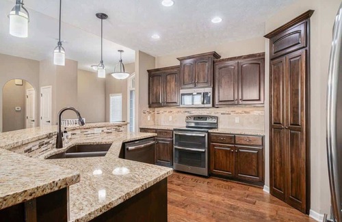 Millard House | Spacious Retreat in West Omaha 2 King 3 Queen Beds