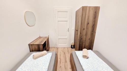 Erdberg House | Spacious Rooms - 15 Min from Airport & City Center, 5 Min from Vienna Main-Bus Station EZ1