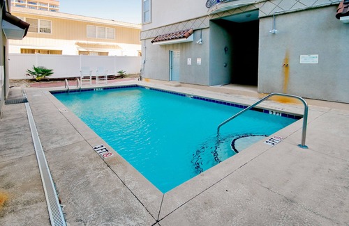 Myrtle Beach House | Spacious three-story coastal villa with resort amenities, balconies & jetted tub