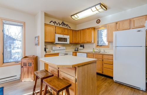 Jackson House | Spacious townhouse with ski & mountain views, deck, grill, & fireplace
