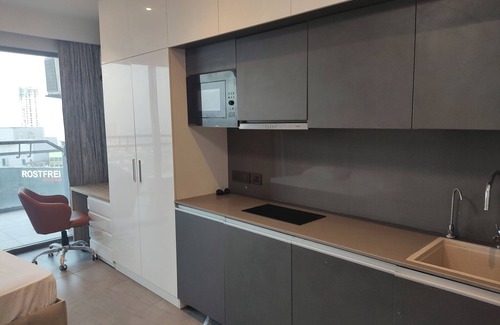 Noida Apartment | Spectacular 34th-Floor Studio with Skyline Views