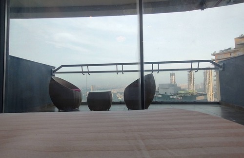 Noida Apartment | Spectacular 34th-Floor Studio with Skyline Views