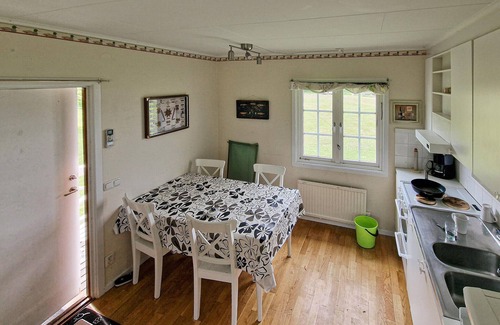 Soderkoping Municipality House | Spend a relaxing holiday in a holiday home right by a picturesque bay.