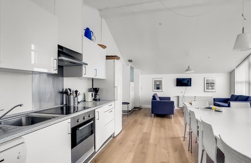 Emmerlev Apartment | Spend an unforgettable vacation in this spacious apartment by the sea.