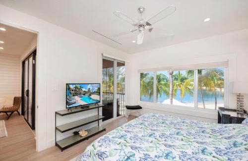 Rum Point Apartment | Starfish Kai - Serene Beachfront Condo with Stunning Bay Views & Resort Amenities