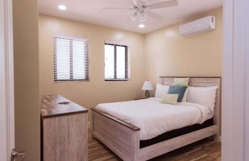 Leeward Settlement Apartment | Stay in a Long Bay Beach Villa with a Shared Pool