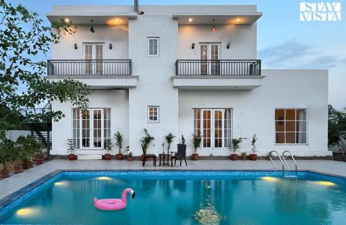 Jaipur Villa | StayVista at Mustang Meadow - Lawn & WiFi