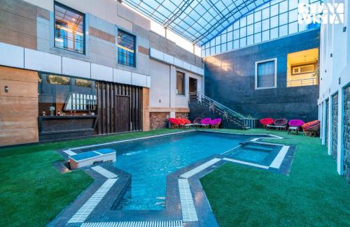 Gurugram Villa | StayVista at Wandering Vines 4BHK Luxury villa with FREE BF, Indoor Pool in Delhi Sohna