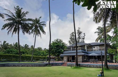 Akshi Villa | StayVista at Waves by the Beach with Beach Access, Pool, Lawn