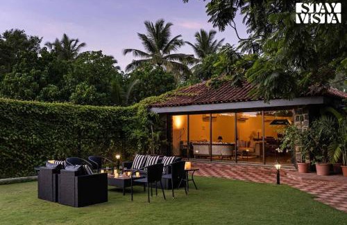 Akshi Villa | StayVista at Waves by the Beach with Beach Access, Pool, Lawn