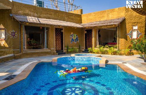 Ajmer Villa | StayVista's Majestic Mud House - Rajasthani Architecture with Modern Amenities, Outdoor Pool, Adventure Activities, and Spa