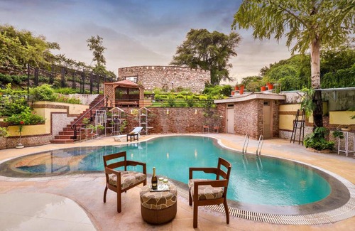 Udaipur Villa | StayVista's Prakriti Farms with Outdoor Pool, Complimentary Breakfast