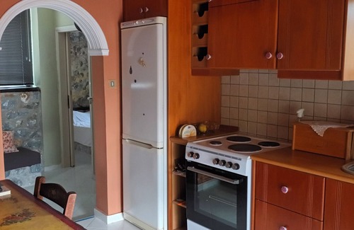 Galatas House | Stone House Among the Trees with Private Garden, Terrace & Wi-Fi