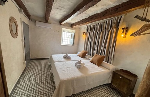 Iznatoraf Apartment | Studio Apartment 'Alojamiento Alberquina' with Shared Garden, Wi-Fi and Air Conditioning