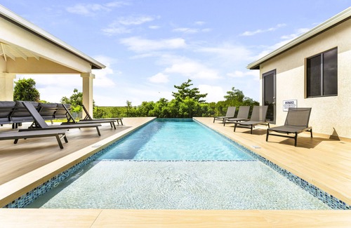 Mullins Villa | Stunning 4 Bed Villa - Sea View, Infinity Pool, Short Walk to Mullins Beach