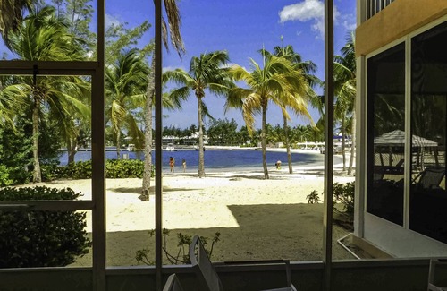 Rum Point Condo | Stunning beachfront condo. Relax, Enjoy, Sunset, RumPoint, Pool & Heated Jacuzzi