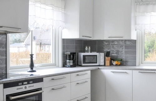 Ed House | Stunning home in Ed with kitchen