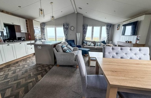 Hopton Cabin | Stunning lodge with full sea views and decking at Broadland Sands ref 20076CF