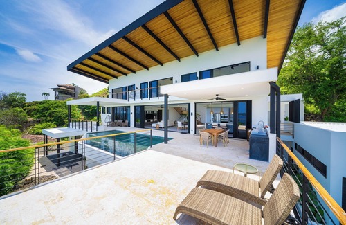 Potrero House | Stunning new 4-bedroom ocean view modern beach home overlooking Flamingo Marina.