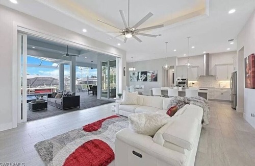 Eight Lakes House | Stunning New Waterfront Luxury Villa with oversized Heated pool and Hot tub!