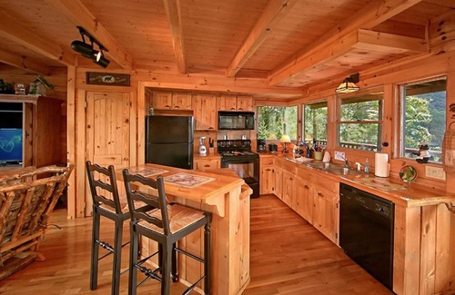 Gatlinburg - Pigeon Forge Cabin | Stunning Views! Private Hot Tub! Wrap-Around Porch! Seasonal Pool Access!