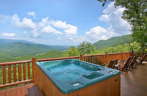 Gatlinburg - Pigeon Forge Cabin | Stunning Views! Private Hot Tub! Wrap-Around Porch! Seasonal Pool Access!