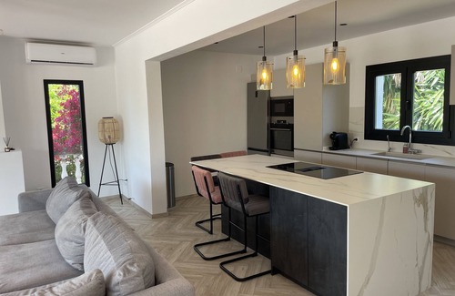 Urbanizacion La Mandarina Villa | Stunning Villa with Scenic Views of Golf Course & Modern Open Plan Kitchen