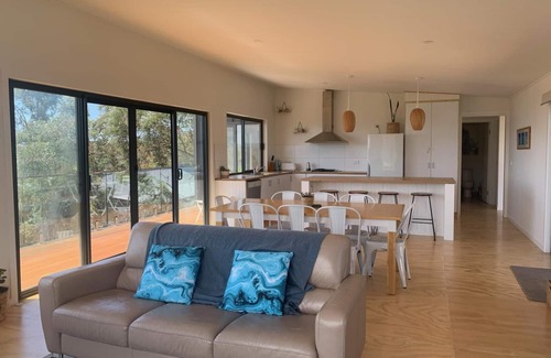 Orford House | Stunning water views; relaxed coastal atmosphere; multiple entertaining areas