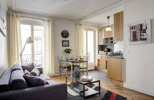 Strasbourg -Saint-Denis Apartment | STYLISH CONTEMPORARY APT: ELEGANT GRAY,RED & BLACK ACCENTS IN BOURGEOIS BUILDING